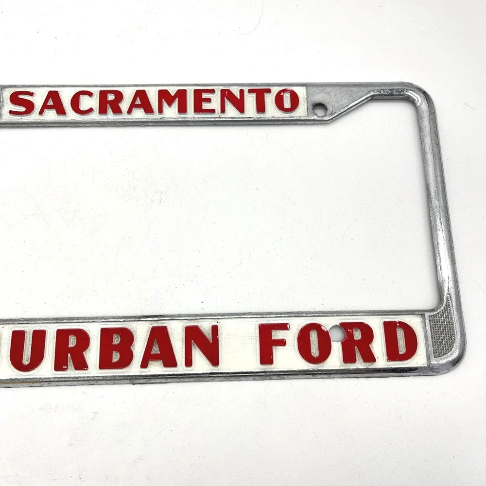 Vintage Suburban Ford Sacramento License Plate Frame Chrome Red White Metal